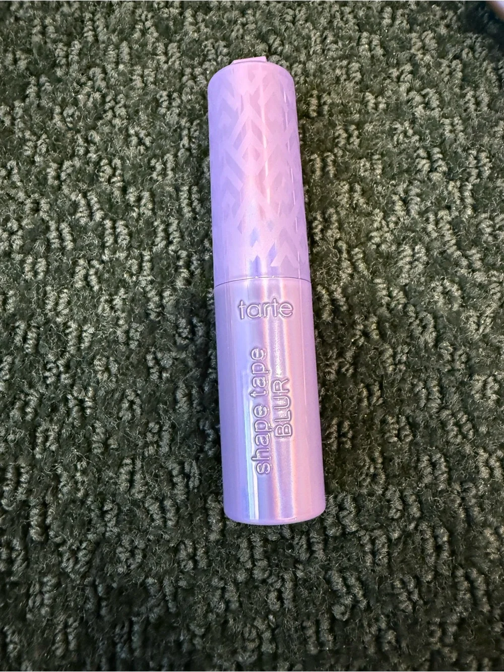 Tarte shape tape in tan deep sand with brush